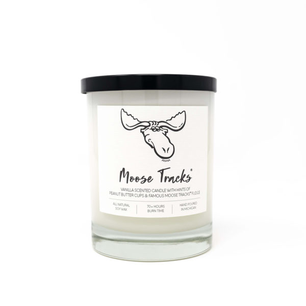white candle with black moose tracks logo and black lid