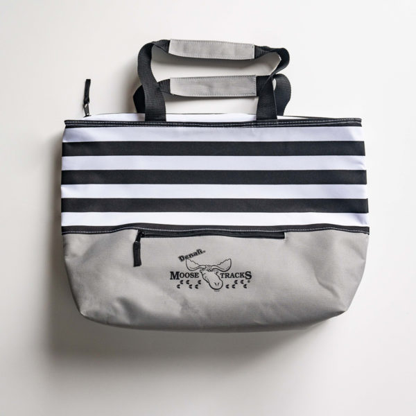 black and white striped cooler bag with grey bottom. has black moose tracks logo