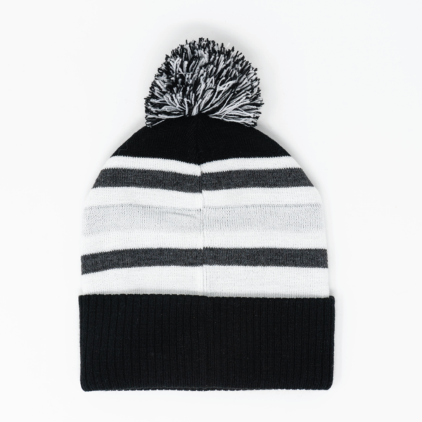 back side of winter beanie on white background. shows black, white, and grey stripes, black cuff, and pom