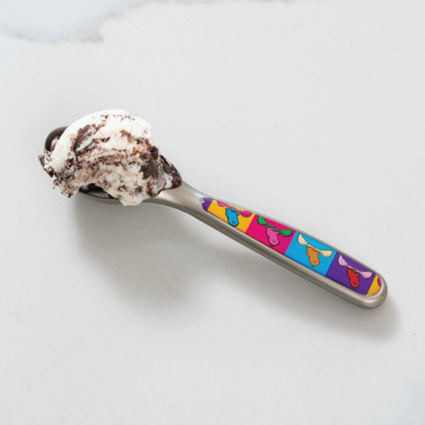 moose tracks pop art ice cream scoop with some moose tracks ice cream on it